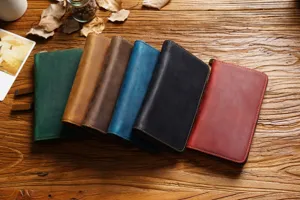 Detail shot of retro genuine leather zipper pencil case multi-slot large capacity pen holder.