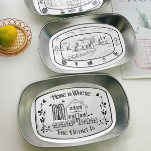 Vintage stainless steel serving tray with American retro black and white illustrations.