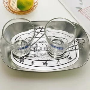 Retro stainless steel tray with glass cups set for home kitchen food storage and table decor.