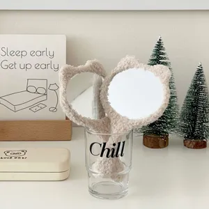 Cute plush bear handheld mirror detail, soft fluffy makeup mirror with handle for daily use.