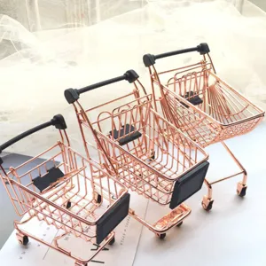 Mini rose gold shopping cart desktop storage organizer and beauty blender holder display prop.