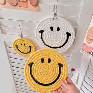 Woven cotton rope smiley face coaster, cute cartoon heat-resistant mat for table and tea cups.