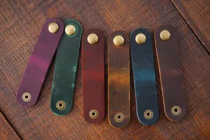 Set d'organisateur de câble en cuir véritable pour écouteurs et chargeurs, gestion des câbles.