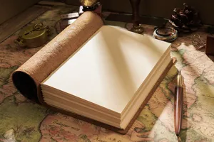 Vintage handmade genuine leather journal notebook close-up, rustic blank diary sketch pad gift.