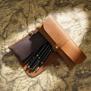 Vintage genuine leather pen case set, retro roll-up stationery pouch for office and school.