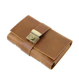 Handmade vintage genuine leather A6 journal notebook with secure brass password lock.