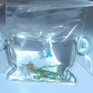 Close-up detail of the transparent goldfish squishy bag toy showing realistic water and fish.