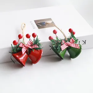 Christmas metal bell hanging ornament with pine needles berries and plaid bow decoration