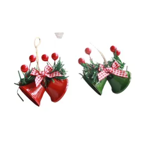 Christmas decorative iron bells with pine needles red berries and gingham bows for tree decor