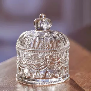 Pot de rangement en verre transparent avec couvercle couronne, idéal pour la déco.