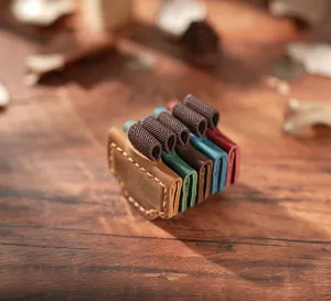 Handmade genuine crazy horse leather magnetic pen clip detail view, vintage stationery accessory