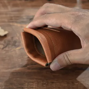 Genuine leather glasses pouch, portable pen bag and automatic closing protective case.