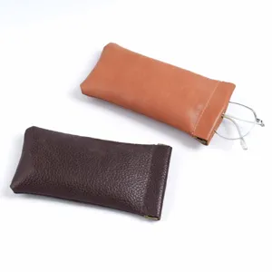 Genuine leather glasses pouch self-closing portable storage bag for men and women daily use.