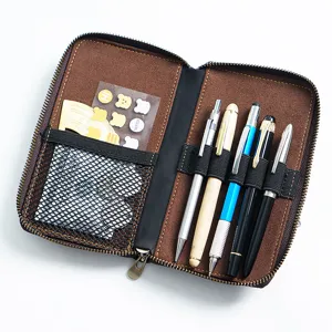 Vintage leather zipper pen case with multi slots and storage pouch for stationery and pens.
