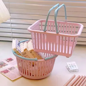 Cute plastic storage basket desktop organizer with dual handles for stationery cosmetics.