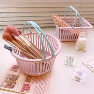 Cute small plastic storage basket for desktop makeup brush organizer and stationery holder.