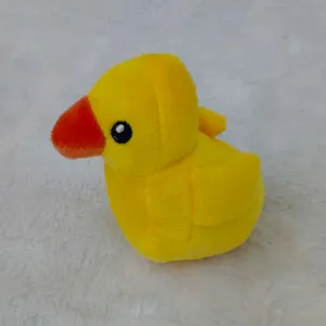 Cute yellow duck plush pet toy, soft squeaky chew toy for dogs and cats, durable fun.