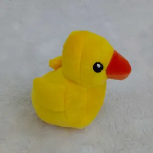Cute yellow duck plush pet toy, soft squeaky chew toy for dogs and cats, main view.