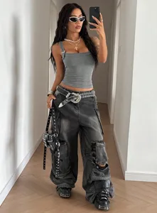 Detailed view showing the grey adjustable strap camisole paired with cargo pants.