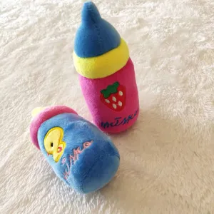 Plush baby bottle squeaky dog toy, soft crystal velvet, bite-resistant pet chewing supply.