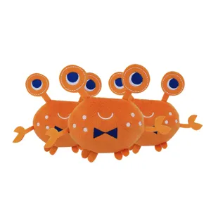 Cute orange plush crab dog chew toy with squeaker and soft fabric for pets main view