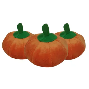 Cute plush pumpkin dog toy set, soft squeaky chew teething toy for pets, orange and green design.