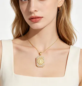 Detailed view of 18K gold plated Virgin Mary pendant necklace with micro-paved zircons