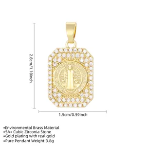 Detailed view of the 2.8cm gold plated religious pendant with cubic zirconia inlay