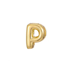 Close-up of a 3D bubble letter P gold pendant for DIY necklace and jewelry making