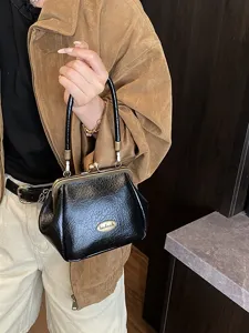 Sac à main rétro noir avec fermoir à clip en cuir souple pour la mode féminine chic