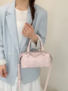 Sac Boston rose élégant en cuir souple avec poignée supérieure pour femme