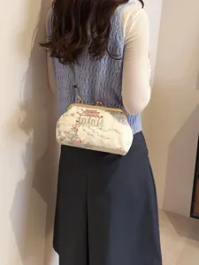 Elegante borsa a tracolla ricamata con motivo paesaggistico tradizionale e chiusura a scatto