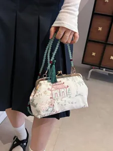 Borsa a mano ricamata in stile cinese con manico in perline verdi e nappa retrò