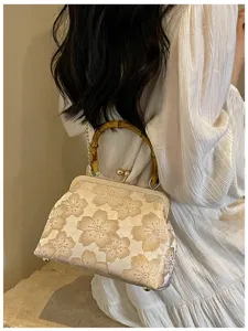 Elegant embroidery flower evening clutch bag with bamboo handle and vintage kiss-lock closure