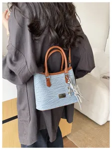 Sac seau en denim élégant pour femmes avec anses en cuir et breloque étoile argent