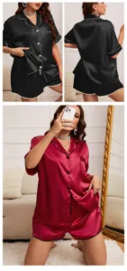Detailed view of women's two-piece silk satin pajama set with button-up shirt and shorts