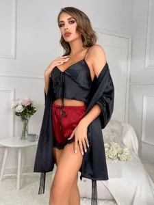 Elegant 3-piece women's satin pajama set featuring camisole red shorts and black robe