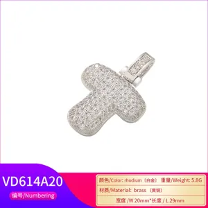 Close-up detail of micro-pave zircon bubble letter T pendant in rhodium finish
