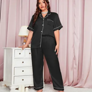 Plus size black satin pajama set with short sleeve top and long pants loungewear