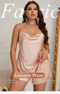 Elegant champagne satin camisole and shorts pajama set on female model