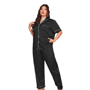 Elegant plus size black satin pajama set with short sleeve shirt and long pants