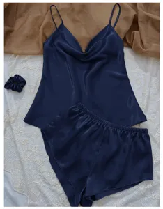 Elegant navy blue ice silk pajama set featuring a camisole top and matching shorts