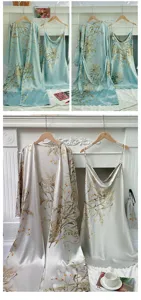 Detail view of floral print faux silk robe and slip dress set in mint and champagne