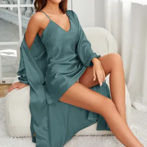 Teal satin sleepwear set featuring a long-sleeved robe and camisole nightgown.