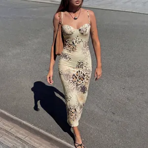 Detailed view of women's summer sexy sleeveless spaghetti strap leopard print midi dress.