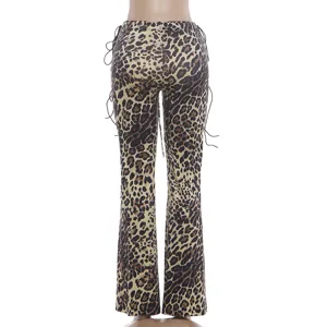Leopard print low waist flare pants, trendy slim fit trousers with side lace up details.