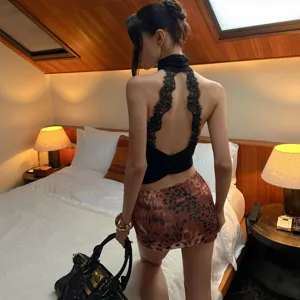 Sexy high-neck backless lace splice sleeveless slim camisole for women, perfect summer top.