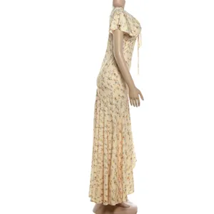 Side view detail of the floral print V-neck maxi dress, highlighting the elegant waist and hem.