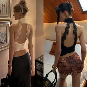 Details of the women's backless lace halter crop top, showcasing the elegant sleeveless design.