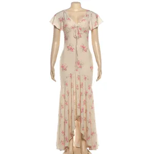 Detailed view of the French floral V-neck maxi dress featuring flutter sleeves and tie front.